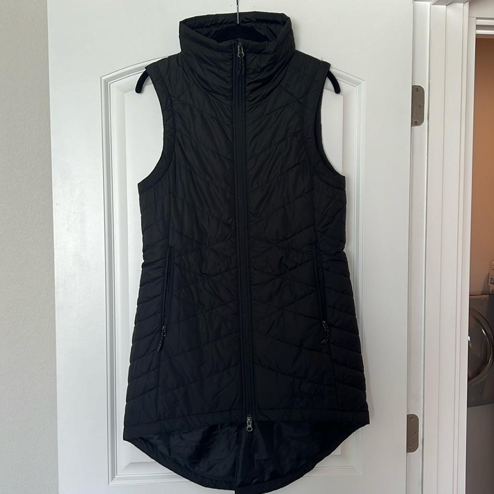 Woman’s black sleeveless vest